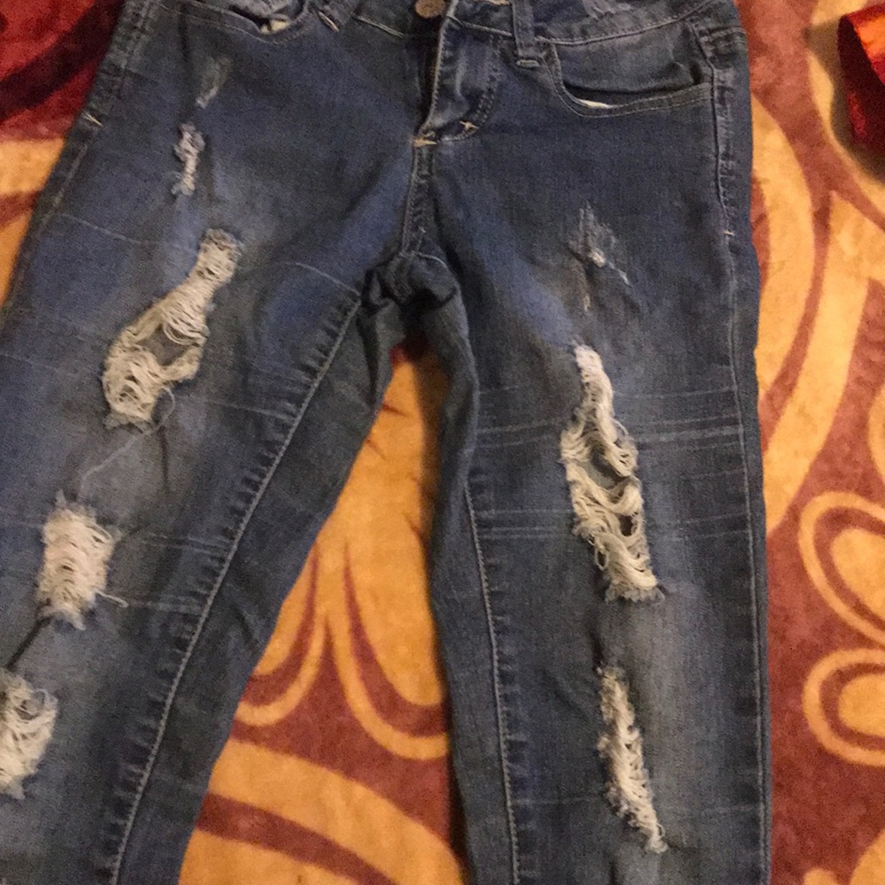 Blue ripped jeans